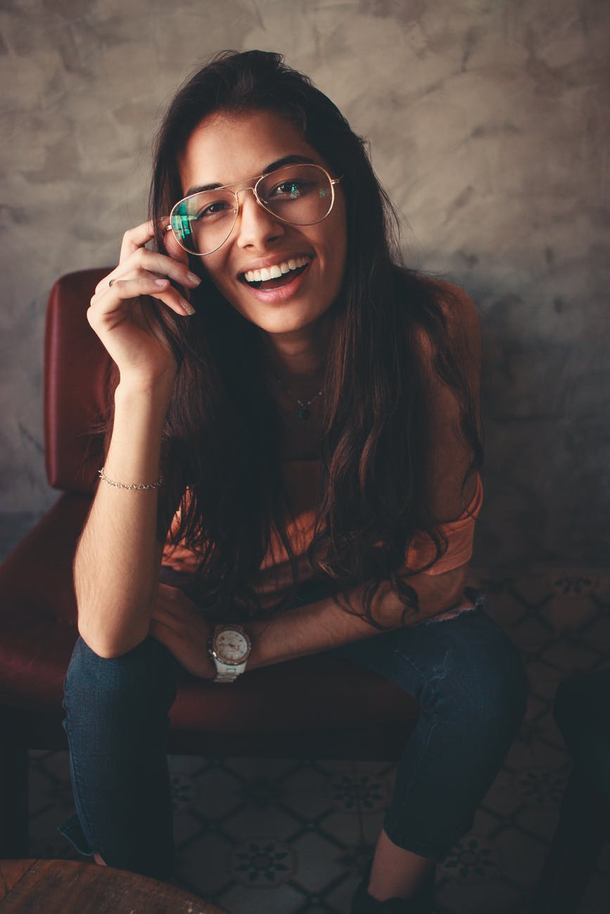 photo of woman wearing eyeglasses